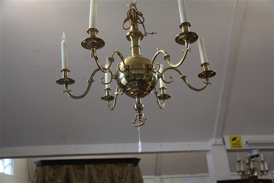 A pair of 17th century style Dutch design six branch ball and column ceiling chandeliers